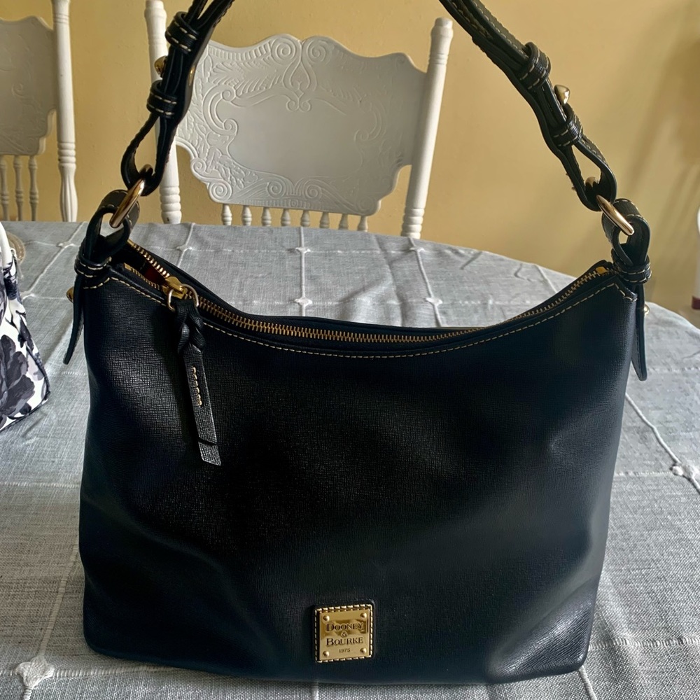 All black Dooney and Burke Saffiano leather purse.
